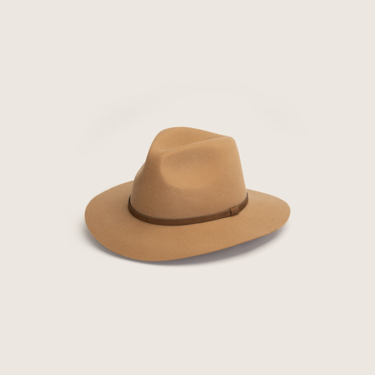 Front view of a camel colored wide-brim floppy hat