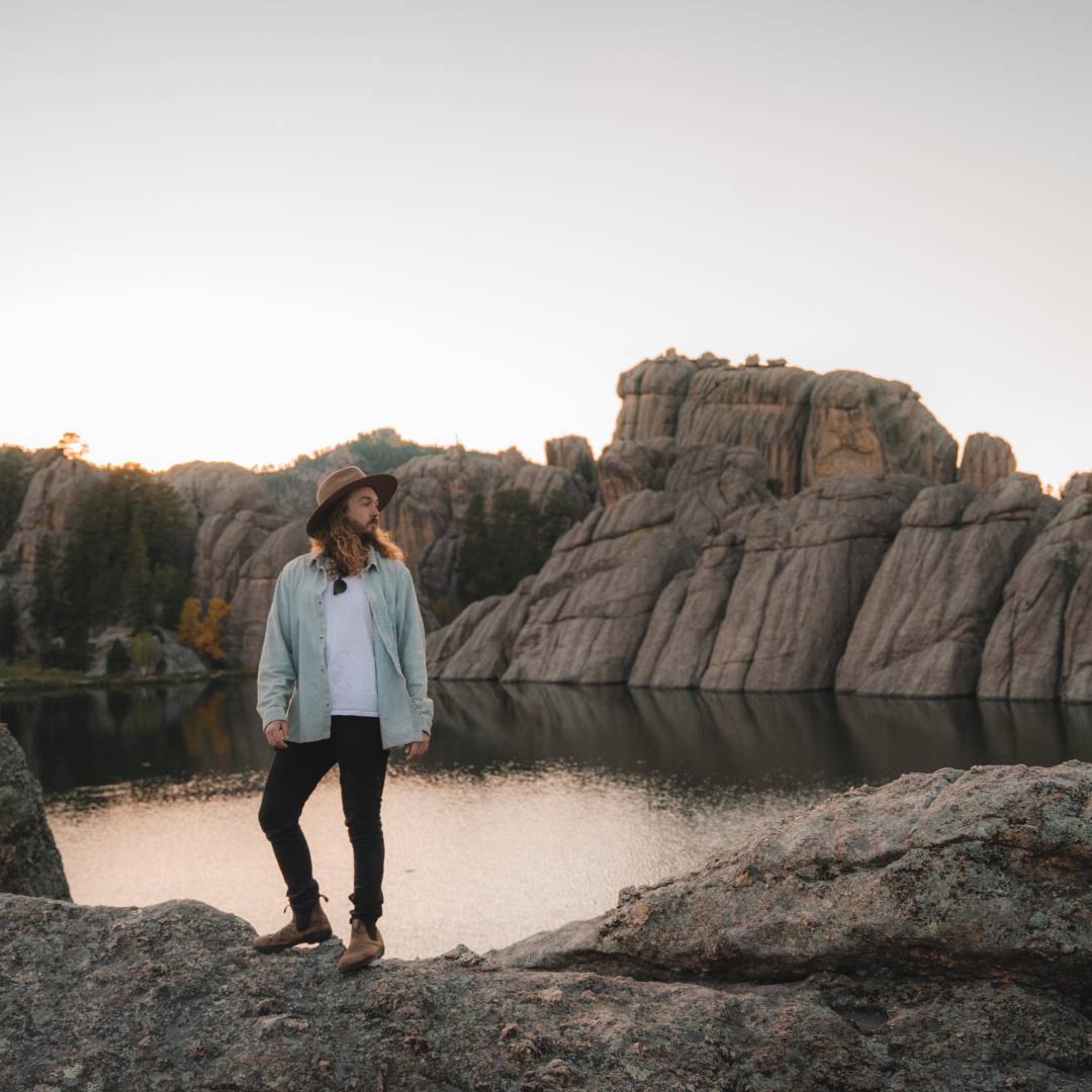 Brayden stands on the edge of Sylvan Lake