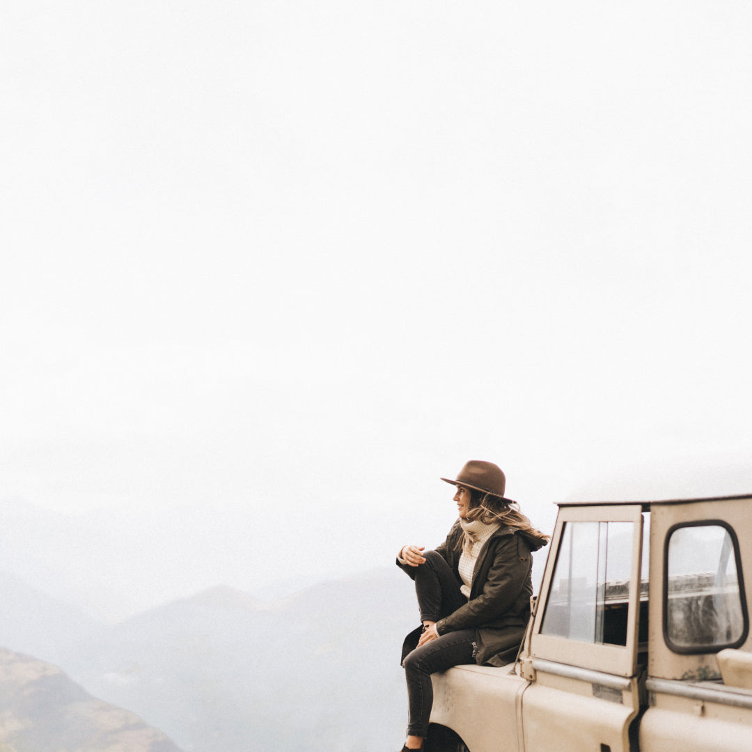 Loz sitting on top of a 4WD bonnet