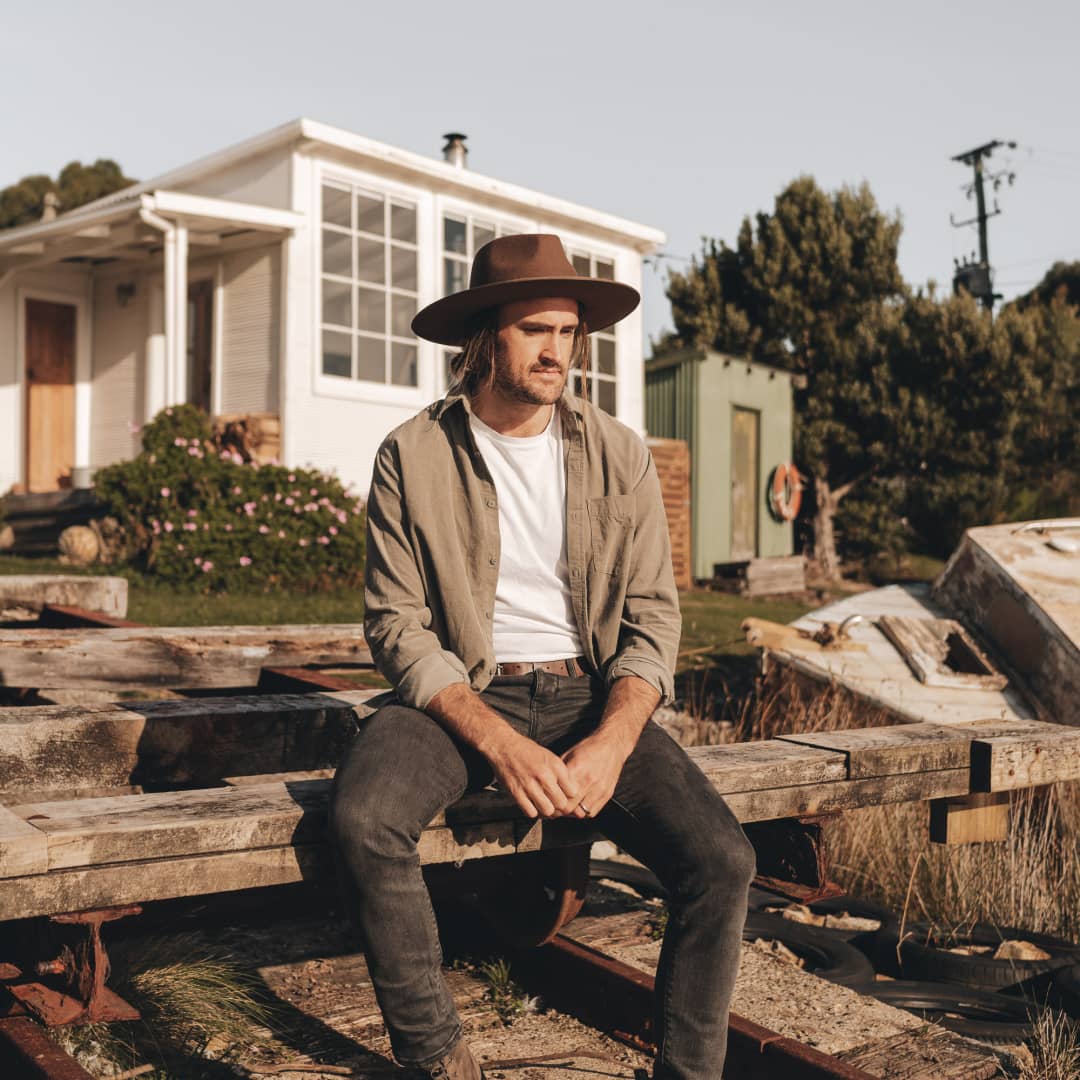 Alex wearing Andy Auburn wide brim wool hat