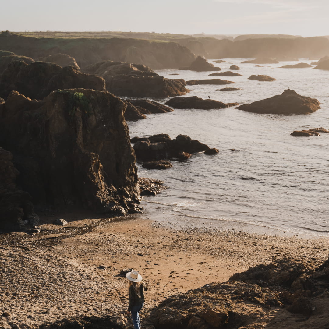 Melissa walking along the beach at Fort Bragg