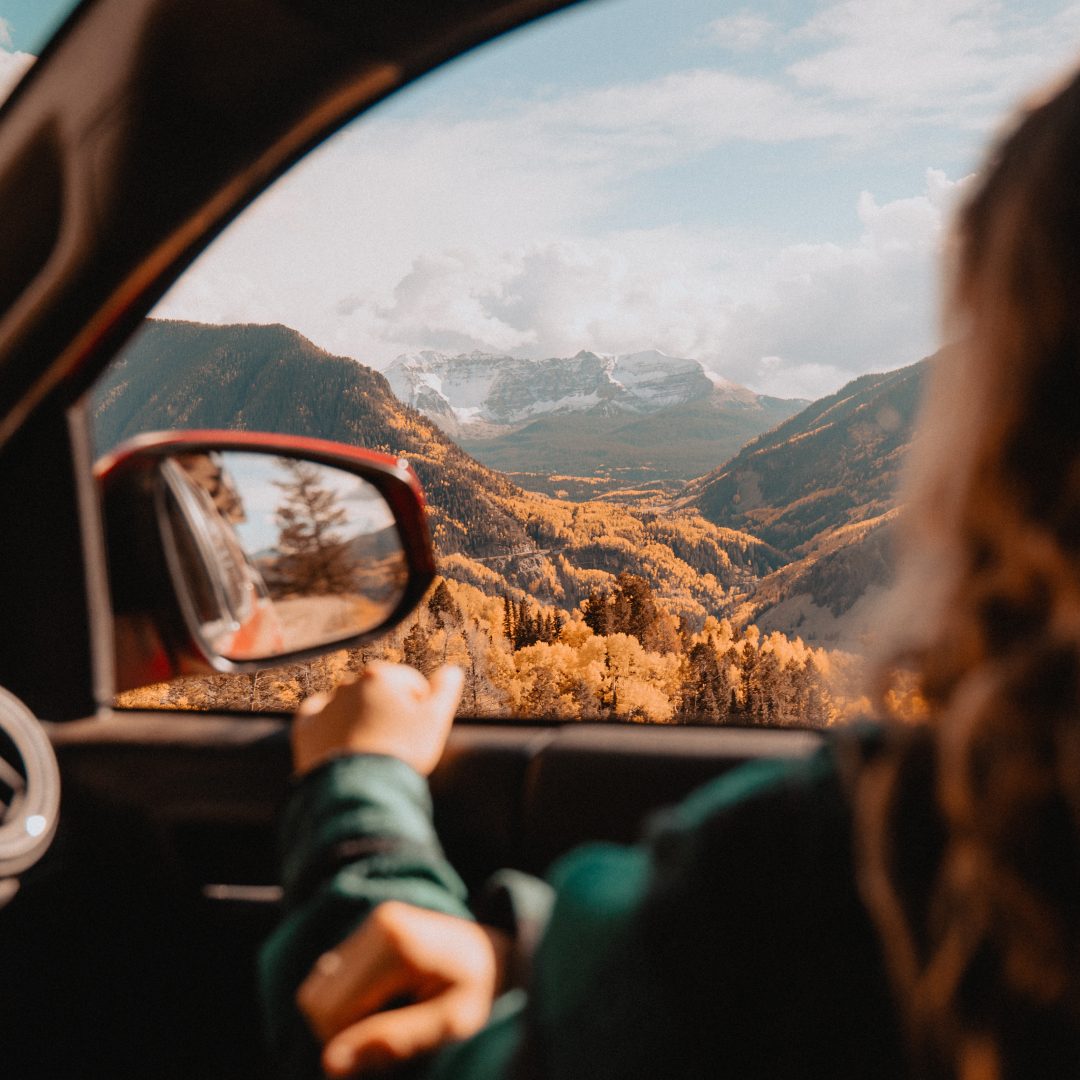 View of mountains through a car window